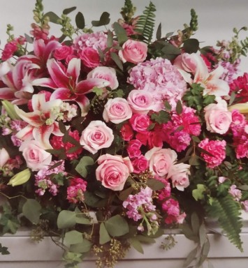Flower All In Blooms Florist flowers on casket Roses